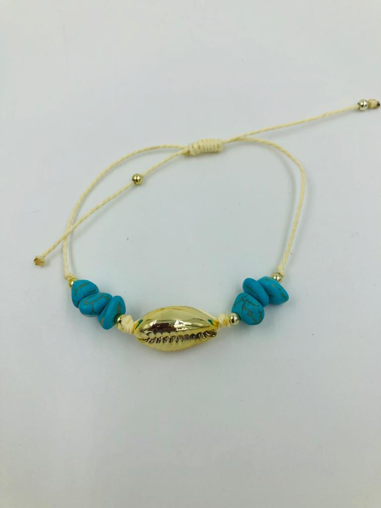 Armbandje goudkleurige schelp